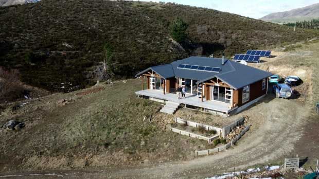 John and Barbara Corcoran have built their house to be off the grid. They have solar power, solar hot water and collect rain water as their water supply. — John Bisset/Fairfax Media.