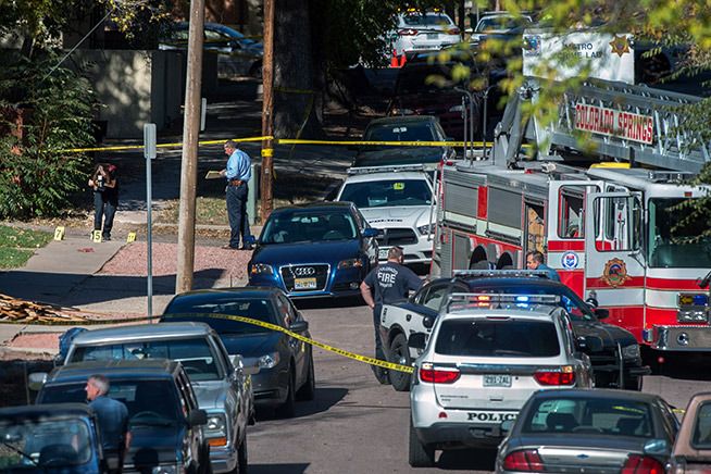 Police investigate the scene after a shooting on Saturday, October 31st, 2015, in Colorado Springs, Colorado. Multiple persons are dead, including a suspected gunman, following a shooting spree according to authorities. Lieutenant Catherine Buckley said the crime scene covers several major downtown streets. — Photograph: Christian Murdock/Colorado Springs Gazette via Associated Press.