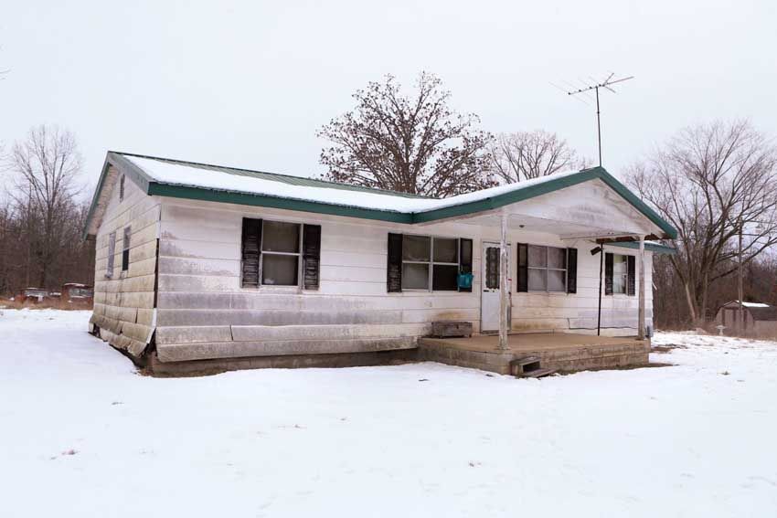 A home in the 4100 block of Highway 137 in Texas County, Missouri, where Joe Aldridge, the suspect in a multiple homicide and suicide, lived as seen on Friday, February 27th, 2015. The incident left at least 8 people dead, including Aldridge. His mother was also found dead, though apparently of natural causes. — Photo: Christian Gooden.