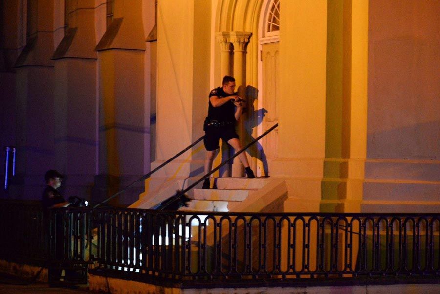 Officers are searching for a suspect in shooting that happened at 9 p.m. at 110 Calhoun Street, site of Mother Emanuel AME Church.  Photo: Matthew Fortner/The Charleston Post and Courier.
