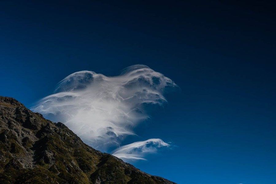 A ghost cloud floats over a ridge.