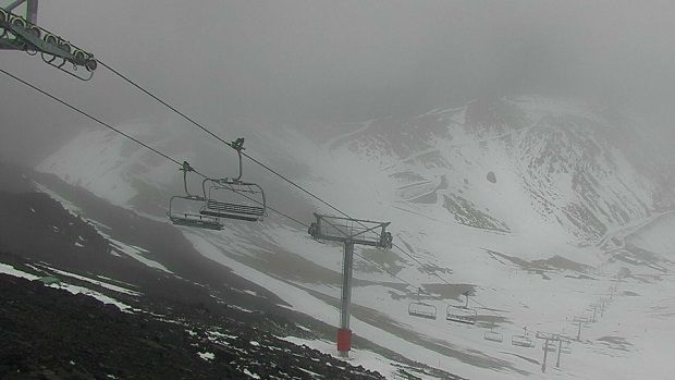 Snow  or lack thereof  under the chairlifts at Mount Hutt.