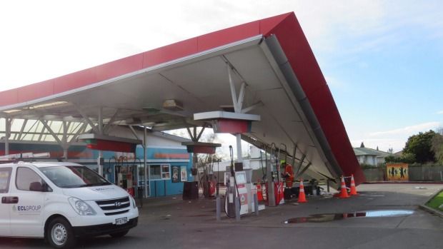 The service station attendant was metres from being hit by the car that careered through the forecourt.  Photograph: Piers Fuller/Fairfax NZ.