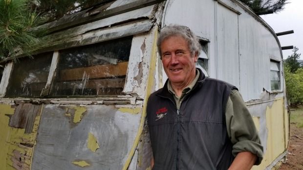 Airshow volunteer Graham Taylor checks out a possible caravan as a candidate for spectacular destruction during the 2018 Warbirds Over Wanaka airshow.