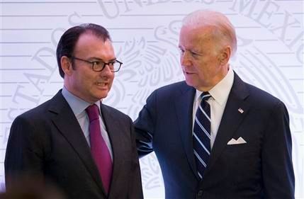 U.S. Vice President Joe Biden, right, talks with Mexico's Finance Minister Luis Videgaray as they arrive for a meeting of the High Level Economic Dialogue between Mexico and the U.S. in Mexico City on Thursday, February 25th, 2016.  Photograph: Rebecca Blackwell/Associated Press.