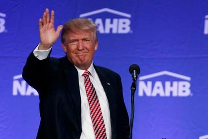 Republican presidential candidate Donald Trump waves after speaking to the National Association of Home Builders on Thursday, August 11th, 2016, in Miami Beach, Florida.  Photograph: Evan Vucci/Associated Press.
