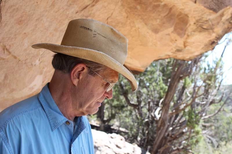 Bud Poe has worked to conserve thousands of acres in Trail Canyon west of Cortez. On his private land is an outlaw cave impossible to see unless you are 10 feet in front of it. — Photo: Courtesy of Andrew Guilliford.