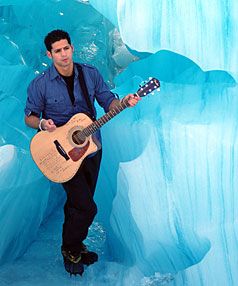 THE BIG CHILL: American musician Mike Scala performs at the Franz Josef Glacier on Monday. — LAURENCE HOY.