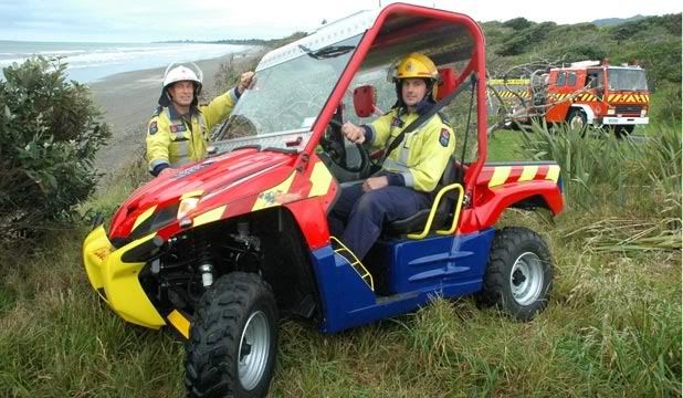 OFF-ROAD RESPONSE: Paekakariki firefighter Ben Flynn and chief Ash Richardson take the brigade's new all-terrain vehicle for a spin in Queen Elizabeth Park.