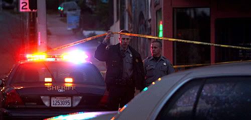 SCENE: Alameda County Sheriff deputies guard a scene where Oakland police officers were shot. (Justin Sullivan/Getty Images)