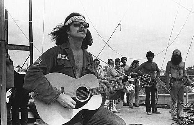 Country Joe McDonald ended up playing a lot more than expected; and performing solo; at Woodstock. — Photo: Handout Art.