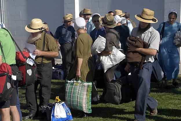 A group of Amish from Ohio were among the passengers aboard the Amtrak train that was struck by a truck at the intersection of U.S. 95 about 65 miles east of Reno Friday morning June 24, 2011. The group load onto buses at Best Elementary School in Fallon. — Photo: Tim Dunn/Reno Gazette-Journal/Associated Press.