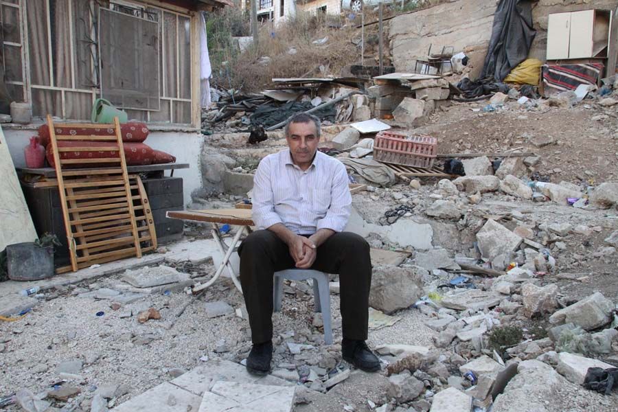 Nureddin Amro at his East Jerusalem home, which was partially demolished this spring.  Photo: Quique Kierszenbaum/The Washington Post.