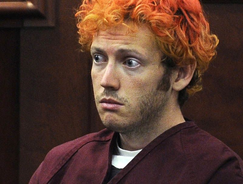 James Holmes, who is charged with killing 12 moviegoers and wounding 70 more in a shooting spree in a crowded theatre in 2012, sits in Arapahoe County District Court in Centennial, Colorado on July 23rd, 2012. Jurors in the Colorado theater shooting case reached a decision Friday, Aug. 7, 2015, on whether Holmes should be sentenced to life in prison or the death penalty. The same jurors rejected Holmes’ insanity defense and convicted him of murder. — Photograph: R.J. Sangosti/The Denver Post.