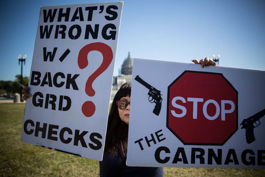 Concerned about their safety and fed up with Congress, university students, organized by the Brady Campaign to Prevent Gun Violence, gathered for a demonstration at Capitol Hill, Washington D.C. on October 6th. — Photograph: Evelyn Hockstein/The Washington Post.