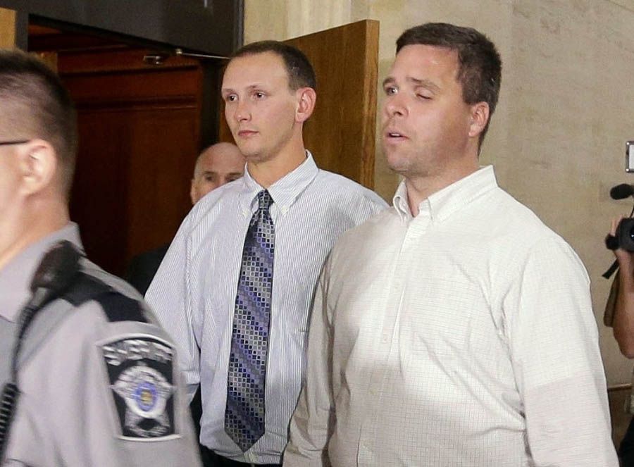 Graham Kunisch right, and Bryan Norberg left, leaving court on Tuesday. — Photograph: Rick Wood/Milwaukee Journal-Sentinel via Associated Press.