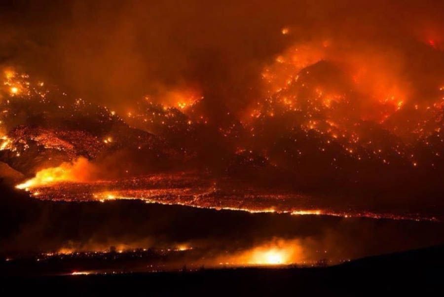 Round fire burning at Wheeler Crest near Bishop, California in February. — Photograph: Jim Stimson/CalFire/Associated Press.