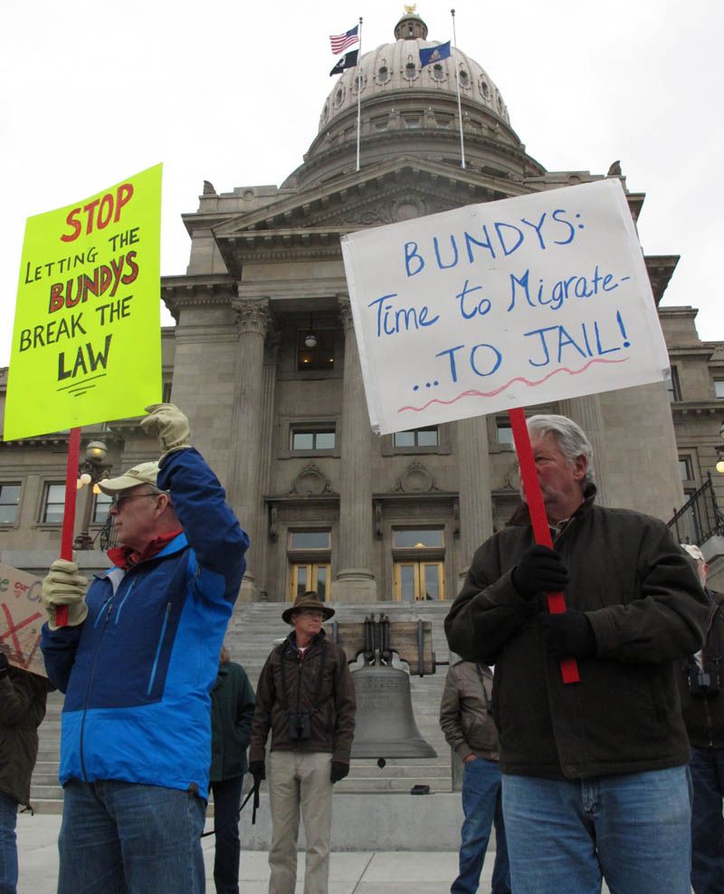 Demonstrators, including environmentalists, bird watchers and sportsmen, gather in front the Statehouse in Boise, Idaho on Tuesday, January 19th, 2016 on  to protest against the recent occupation of the Malheur National Wildlife Refuge in southeastern Oregon by group of armed activists. More than 100 protesters gathered calling for the arrest and prosecution of the group for taking over public land. — Photograph: Kimberlee Kruesi/Associated Press.