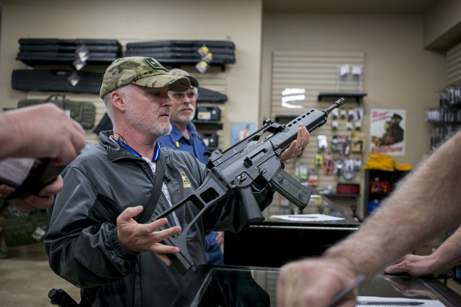 C.J. Grisham, president of Open Carry Texas, goes shooting at a gun range in Temple, Texas.  Photograph: Ilana Panich-Linsman/The Washington Post.