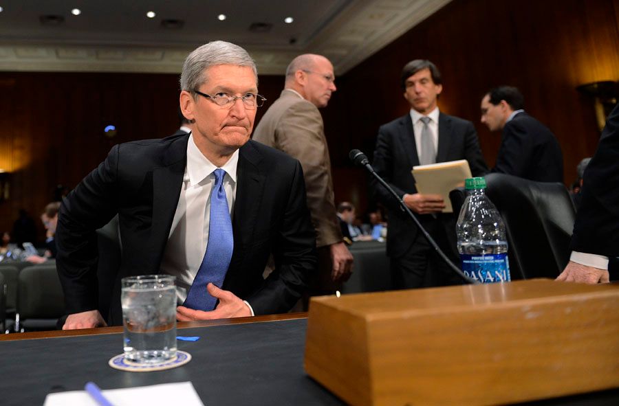 Apple chief executive Tim Cook, shown here in a 2013 appearance before a Senate committee, has pledged to fight an order to help the federal government access data officials believe is stored on the iPhone linked to the San Bernardino terrorists. — Photograph: Shawn Thew/EPA.