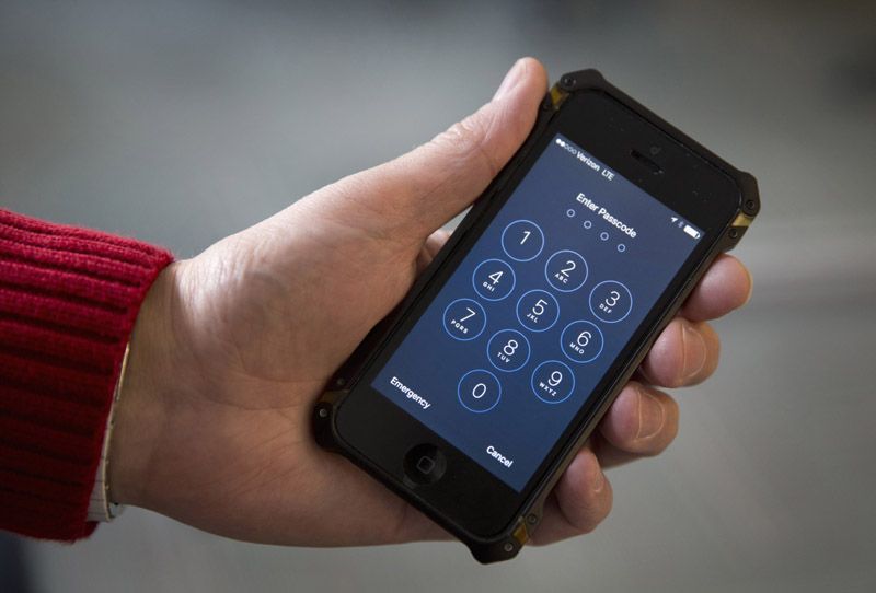 An iPhone passcode screen.  Photograph: Carolyn Kaster/Associated Press.