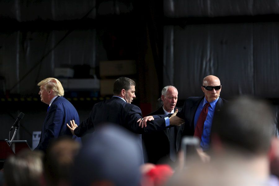 “I was ready for him, but it’s much easier if the cops do it, don’t we agree?” Trump quipped after the man was taken away. “And to think I had such an easy life! What do I need this for, right?”. — Photograph: Aaron P. Bernstein/Reuters.