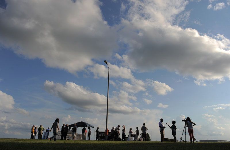 People opposed to the death penalty and reporters gathered near the Florida State Prison in 2014. — Photograph: Matt McClain/The Washington Post.