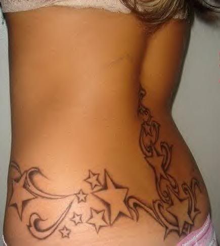 I Love Tattoos on women! Thats a plus with me!